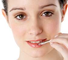 applying lip balm