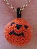 crocheted pumpkin pendant