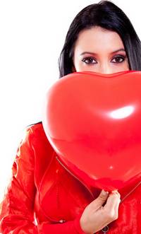 woman with heart shaped valentine balloon
