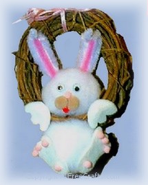 pompom Easter bunny hanging on a wreath