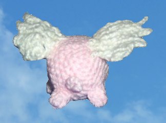 crocheted winged pig - back view
