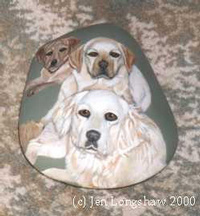 pet dogs painted on a rock