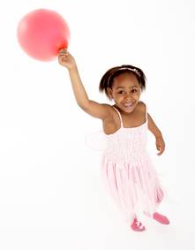 girl holding balloon
