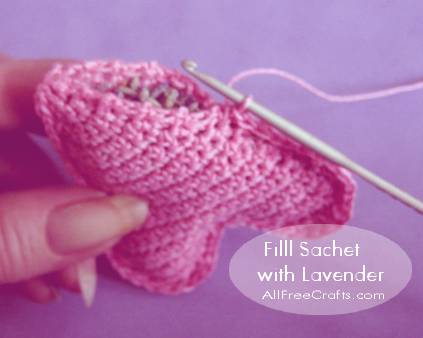 filling crocheted hearts with lavender