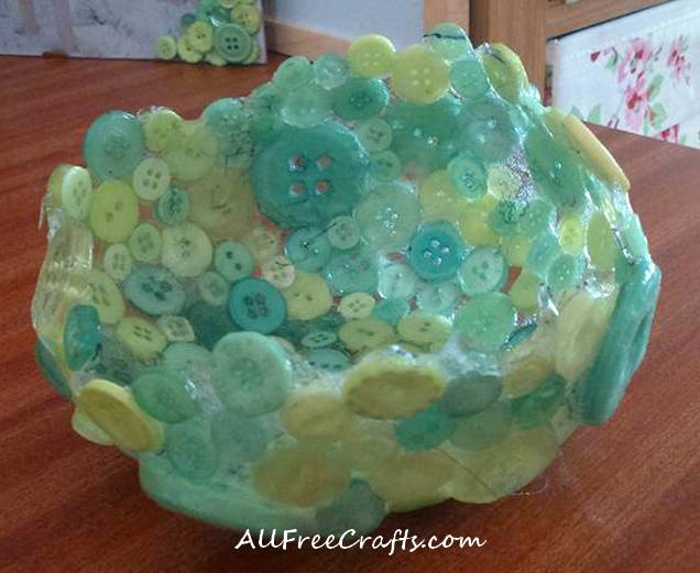 completed mod podge button bowl waiting for glue to dry