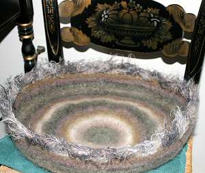 round cat bed with eyelash yarn edging