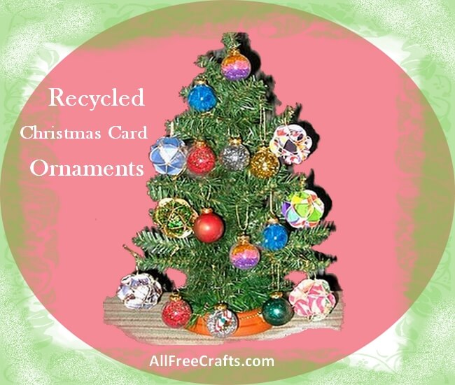 small christmas tree with recycled christmas card ornaments
