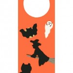 halloween silhouettes on a craft foam door hanger
