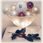 illuminated bowl of Christmas ornaments