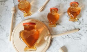 honey in heart shape jars