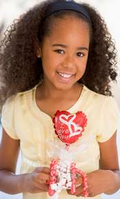 girl holding a valentine heart