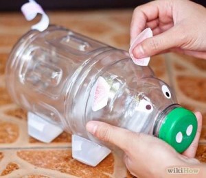 decorating a bottle piggy bank