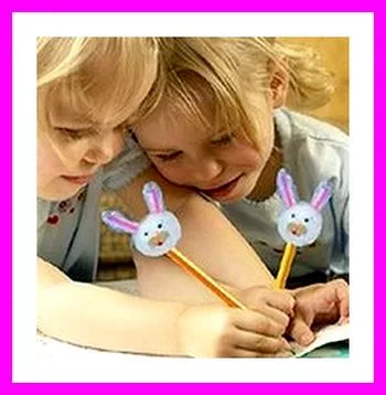 children drawing with homemade Easter bunny pencils