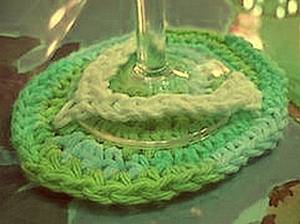 green crocheted flip-flop wine coaster