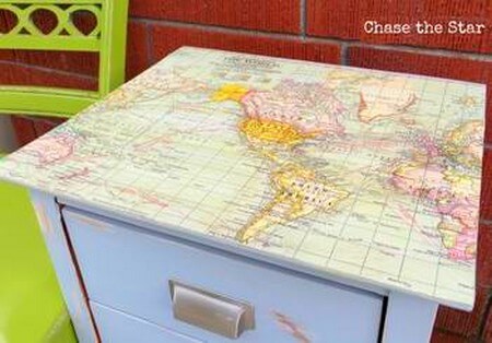 closeup of map decoupaged on top of table