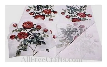 rose motif paper napkins being separated for decoupage
