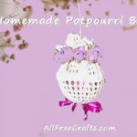 homemade potpourri ball with doily cover