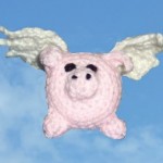 crocheted flying pig