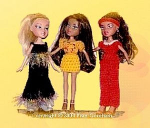 three crocheted outfits for ten inch dolls