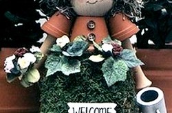 gardener figurine made from clay pots