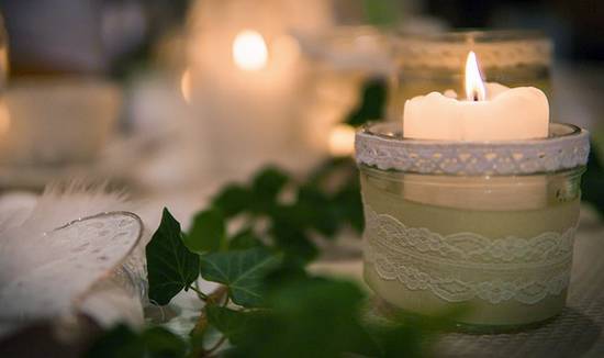 candles embellished with lace ribbon