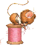 mouse on top of sewing thread