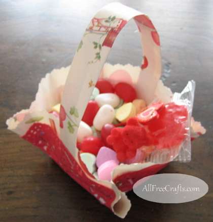 paper Valentine basket filled with goodies