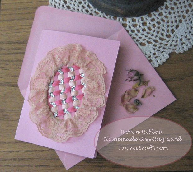 homemade greeting card with oval woven ribbon and lace inset