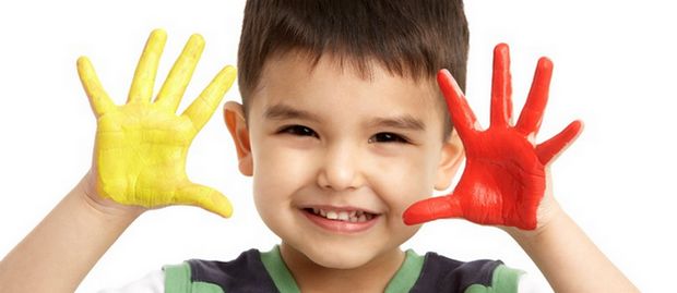 child with painted hands