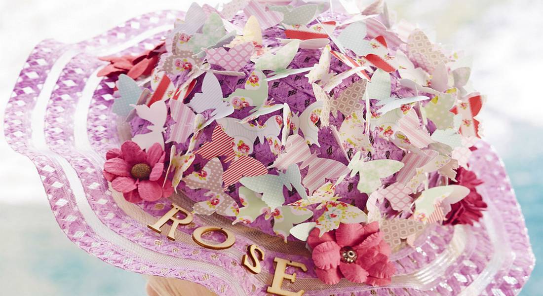 straw hat festooned with butterflies