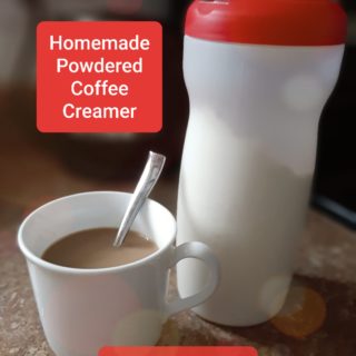 cup of coffee beside homemade powdered coffee creamer