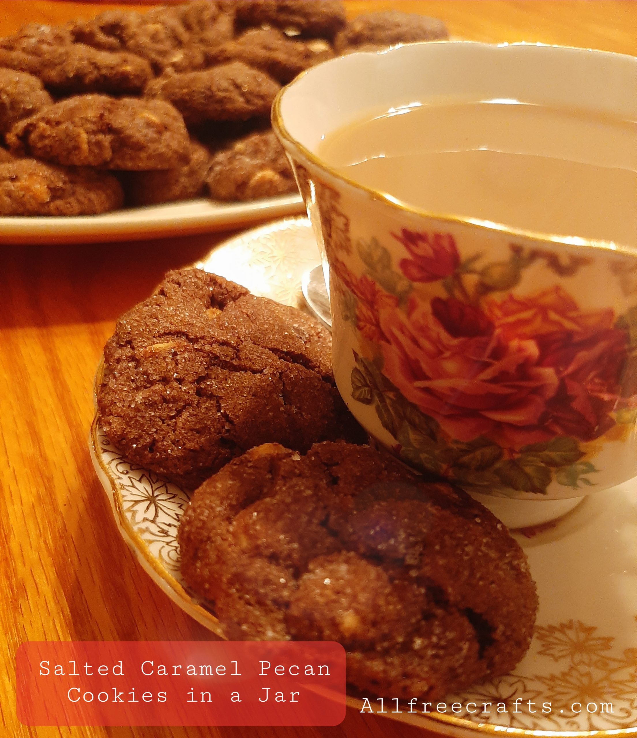 salted caramel pecan cookies with a cup of tea