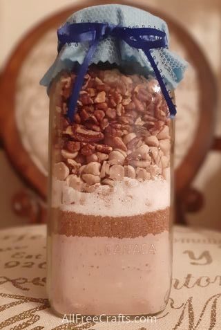 layered cookies in a jar