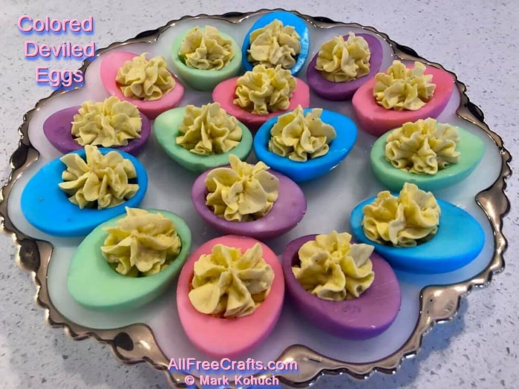 plate of beautifully colored deviled eggs