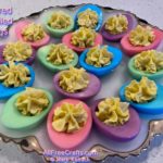 plate of beautifully colored deviled eggs