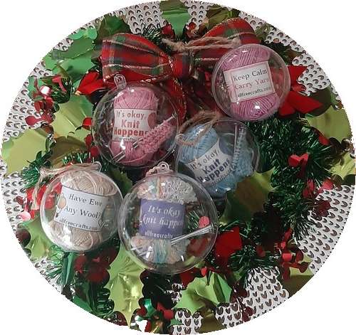 group of yarn ornaments on a wreath background