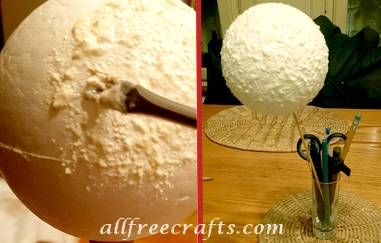 applying textured snow paint to a foam ball