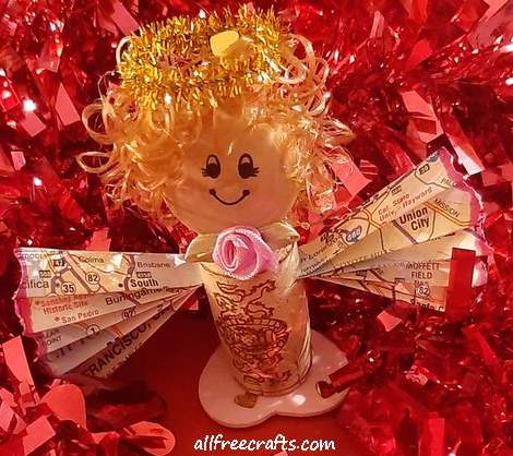 valentine wine cork angel with wings made from a map