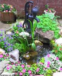 homemade water fountain and small pond